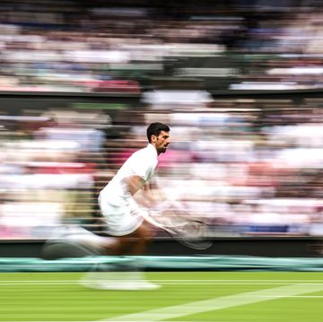london, england july 03 novak djokovic of serbia plays a forehand in the men's singles first round match against pedro cachin of argentina during day one of the championships wimbledon 2023 at all england lawn tennis and croquet club on july 03, 2023 in london, england photo by shi tanggetty images